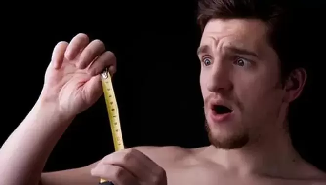 Man measures his penis before enlarging it