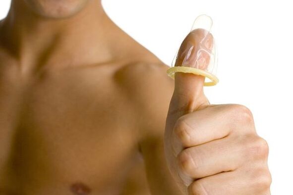 Condoms on fingers symbolize teenage penis enlargement